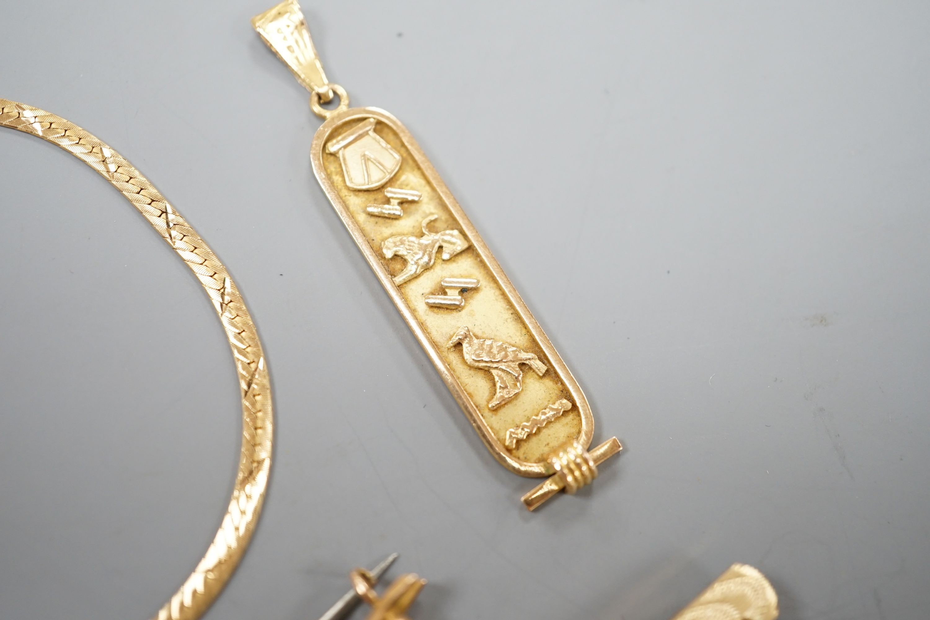 A Middle Eastern pendant and bracelet, gross 6.5 grams, together with a 9ct bar brooch and a rolled gold tie clip.